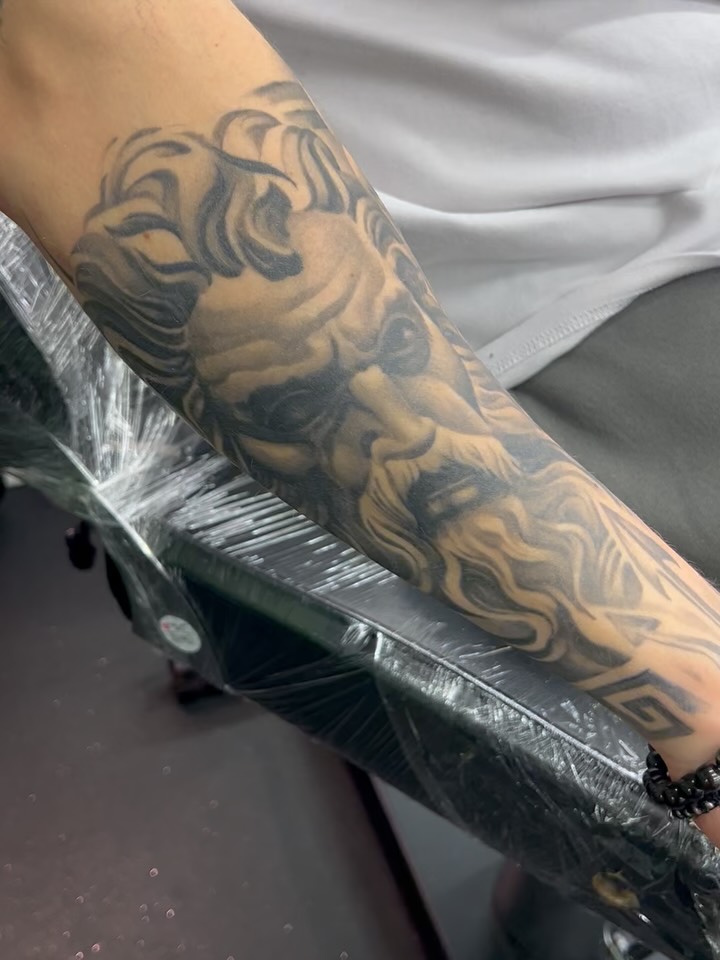 Tattoo by Sin Lanson